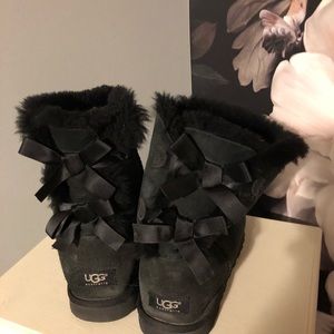 Black UGG boots with bows